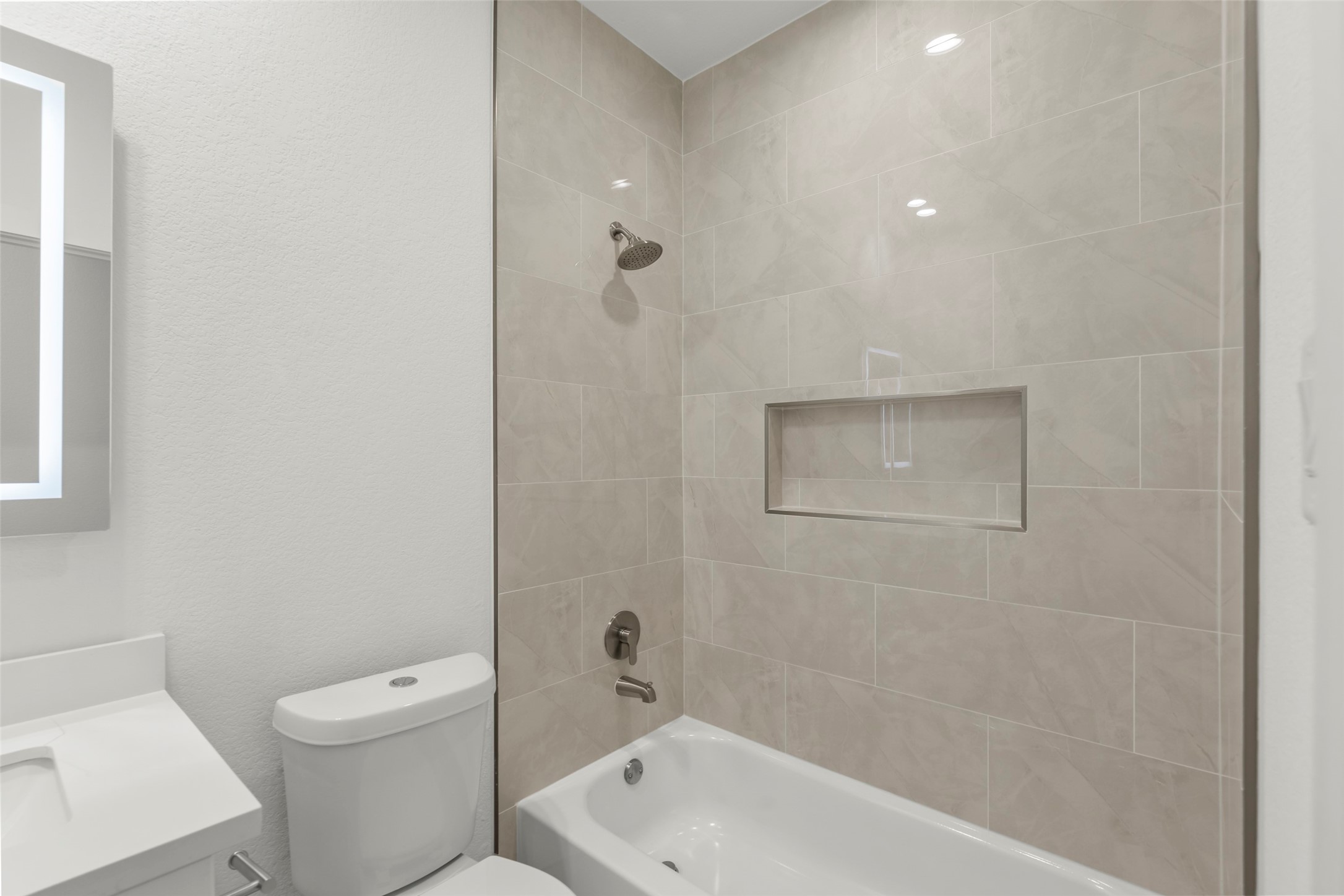 1477 Ferguson Way Houston, TX 77088 - Photo 30 of 37 a bathroom with a toilet a sink and bathtub