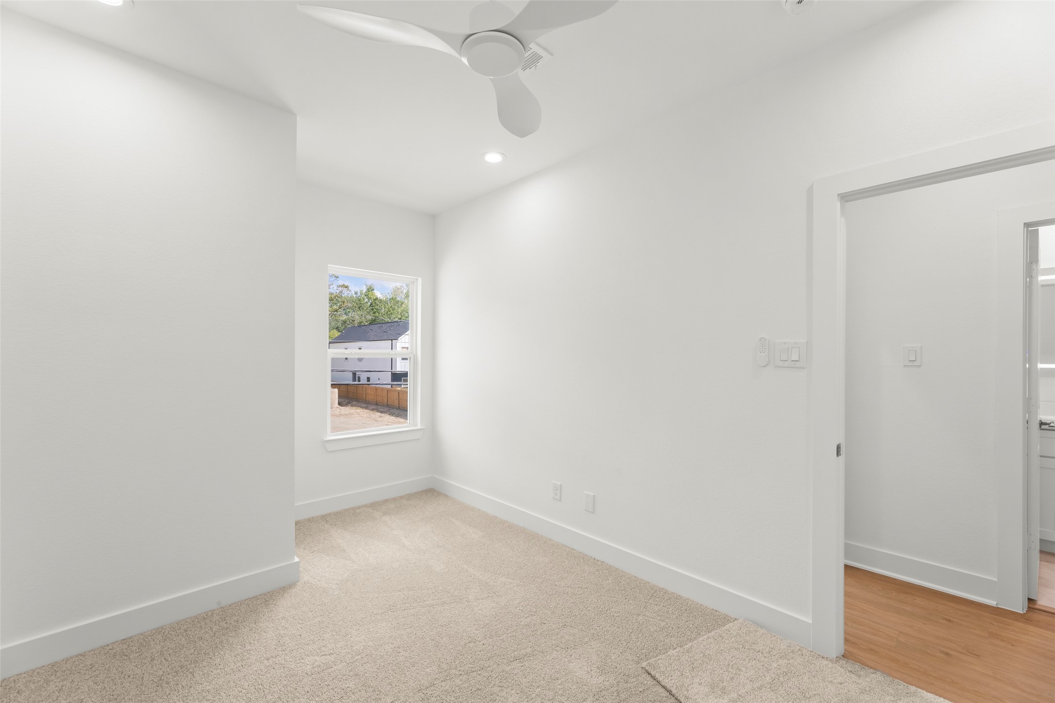 1477 Ferguson Way Houston, TX 77088 - Photo 31 of 37 an empty room with windows