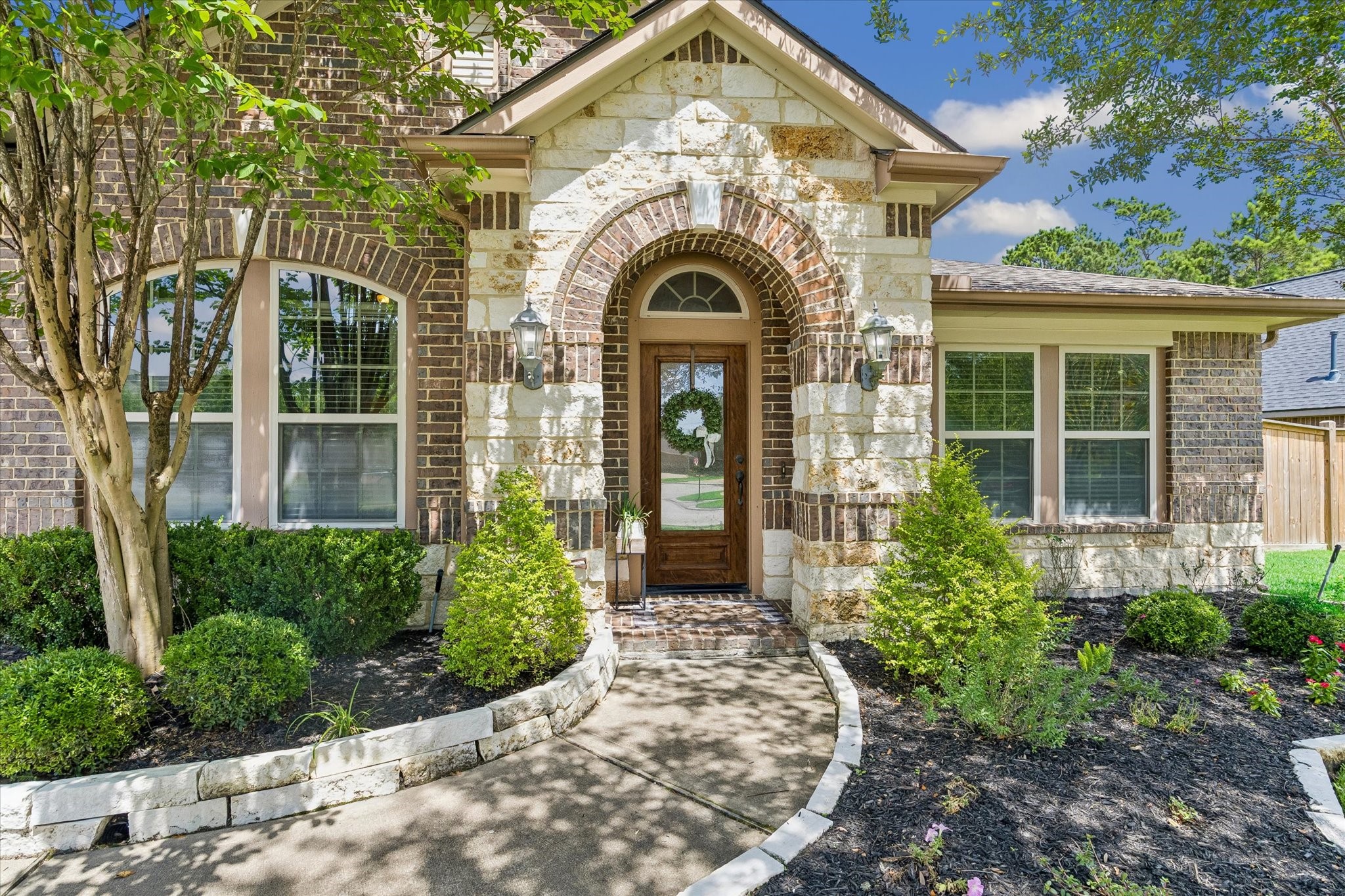 31306 Brighton Brook Lane Spring, TX 77386 - Photo 2 of 34 Elegant arched entryway creates a warm and inviting first impression.