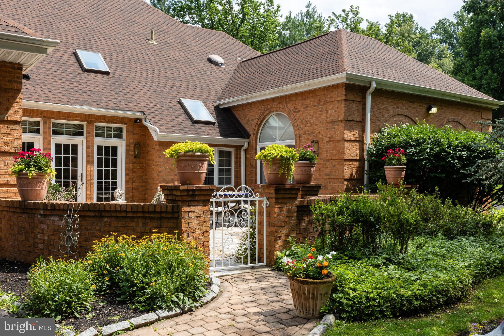 1733 Stocton Road Jenkintown, PA 19046 - Photo 15 of 149 a front view of a house with a garden