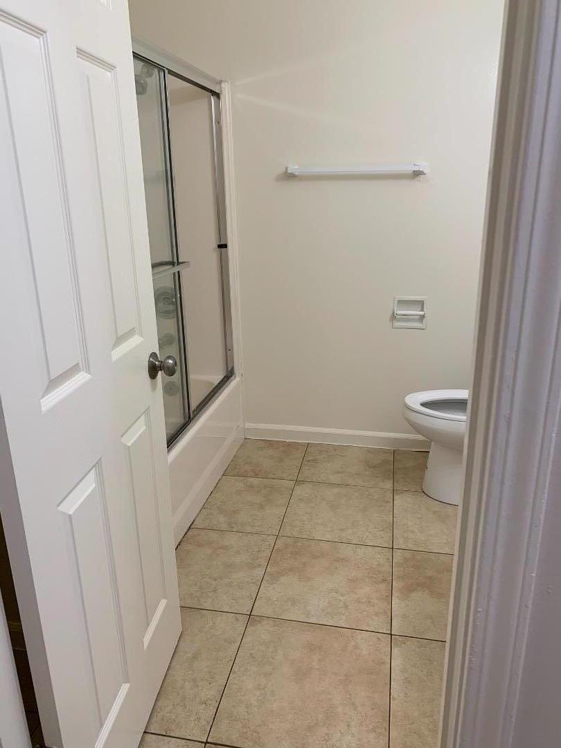 3786 Rolison Road Redwood City, CA 94063 - Photo 14 of 18 a bathroom with a toilet and a shower