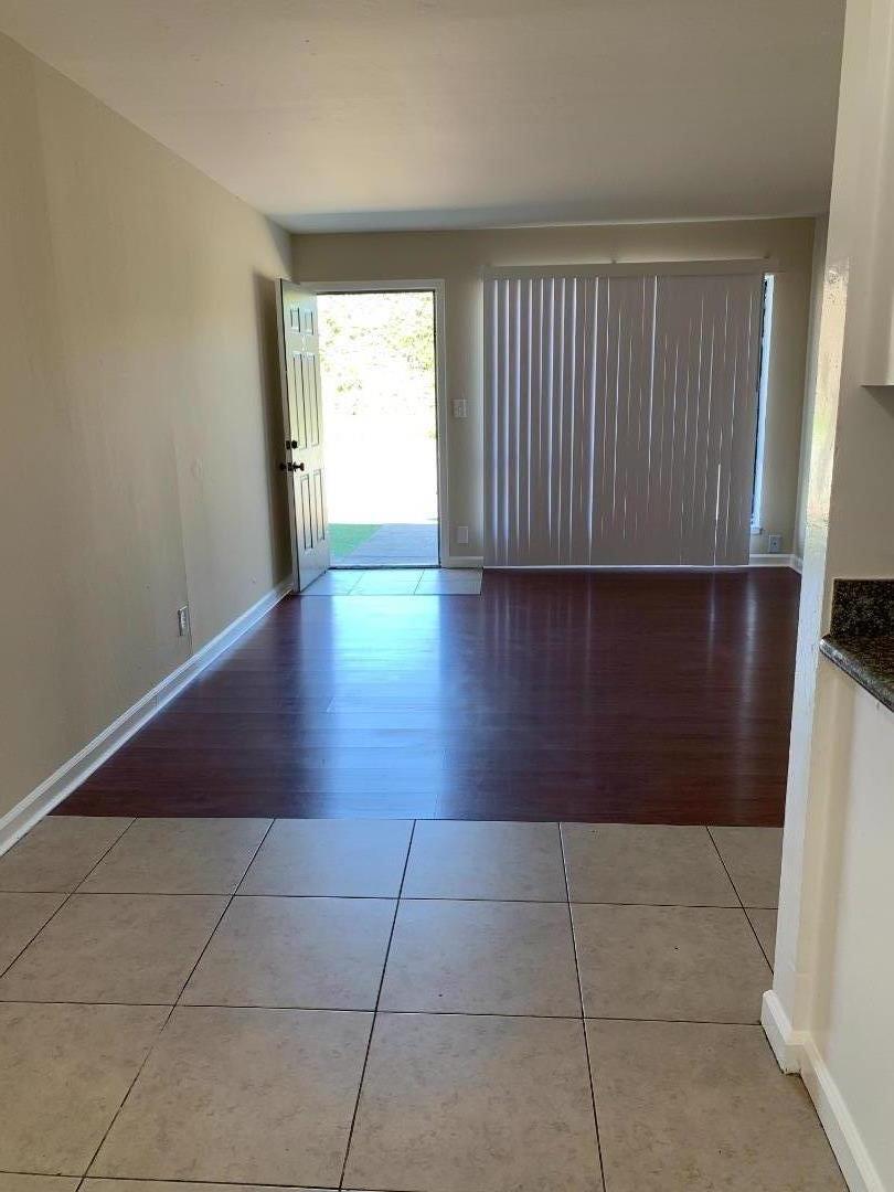 3786 Rolison Road Redwood City, CA 94063 - Photo 18 of 18 a view of a livingroom with wooden floor and a window