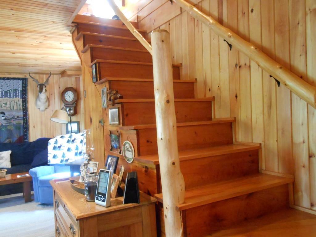 67 Camp Road Bryant Pond, ME 04219 - Photo 15 of 35 Notice the banisters.