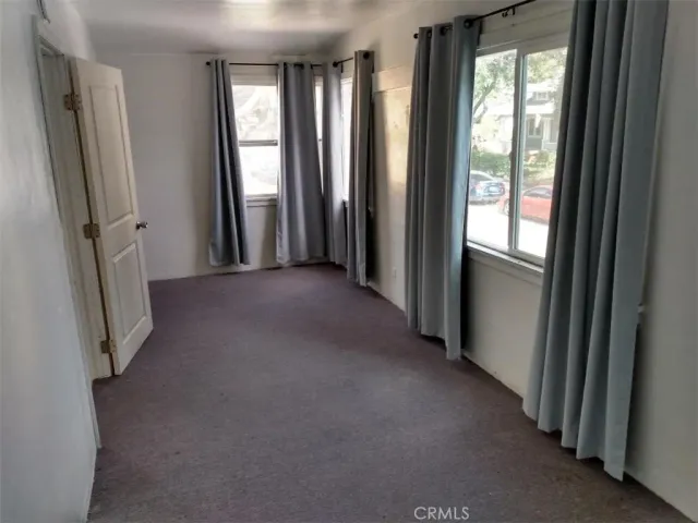 a view of a room with windows