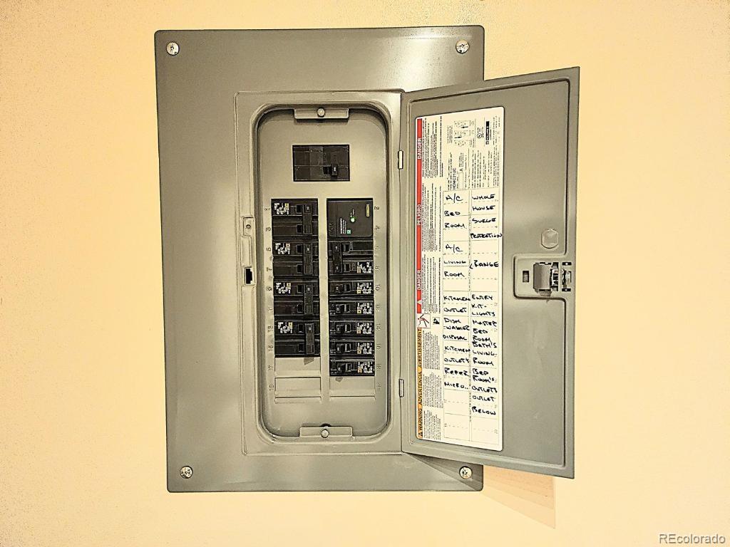 9655 Center Avenue, Unit 5A Denver, CO 80247 - Photo 3 of 45 a front view of a house