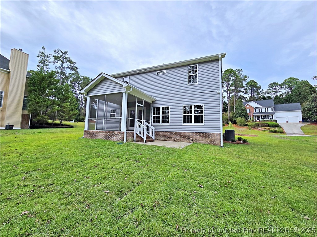 425 Shawcroft Road Fayetteville, NC 28311 - Photo 48 of 50 a front view of a house with a garden