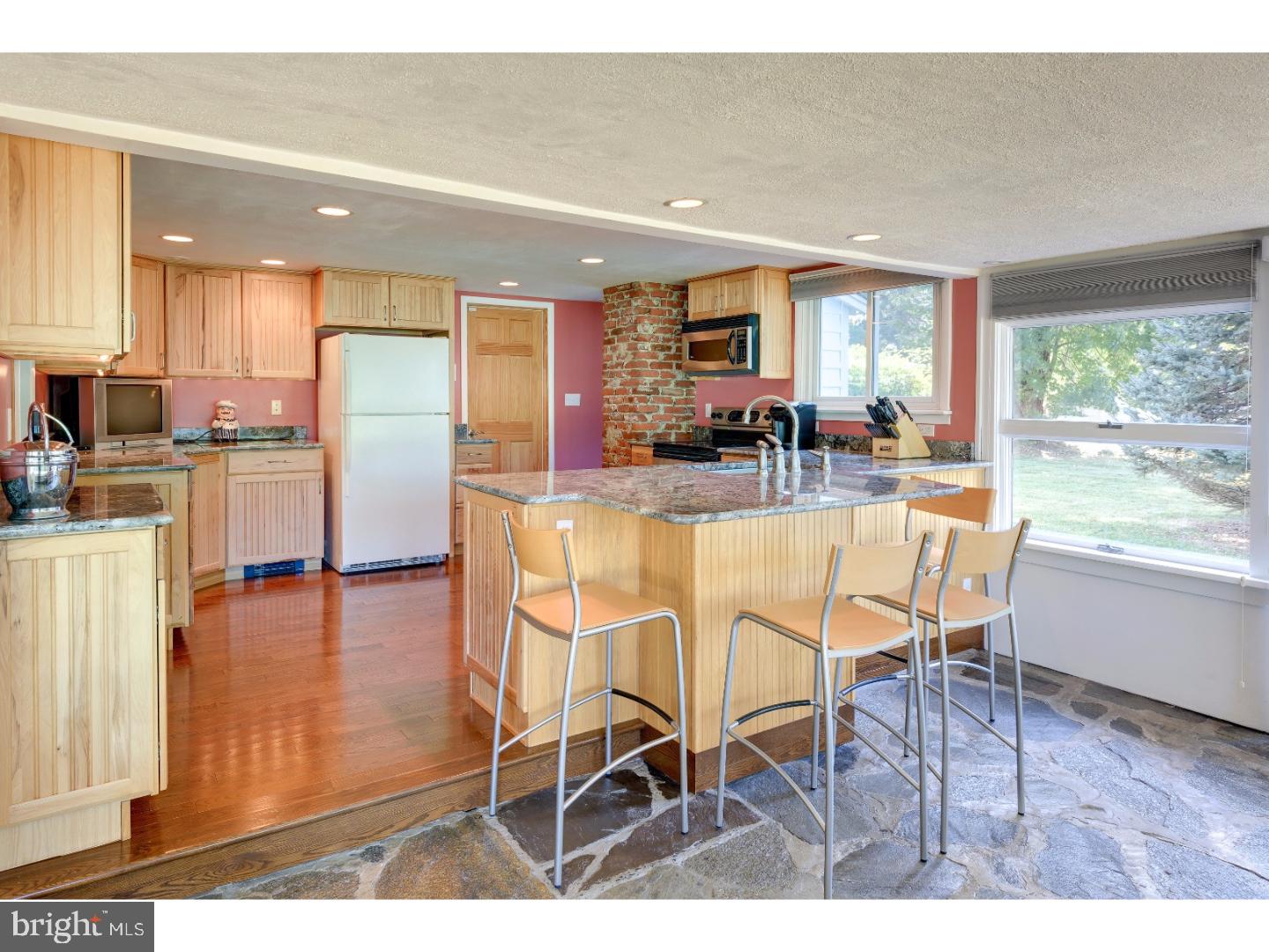 500 Gulph Road Wayne, PA 19087 - Photo 9 of 25 a dining area with furniture and wooden floor