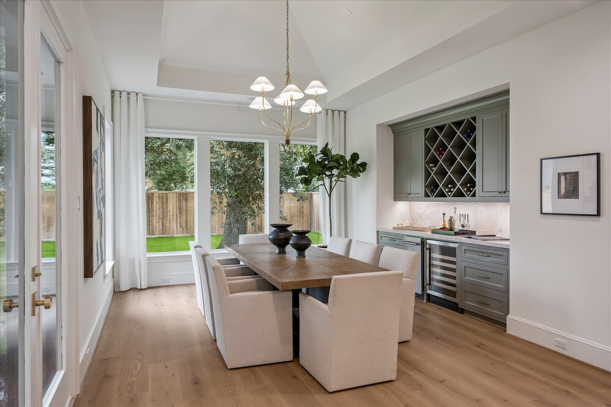1618 Ronson Road Houston, TX 77055 - Photo 14 of 43 Formal dining area with wine storage, ice maker and fridge
