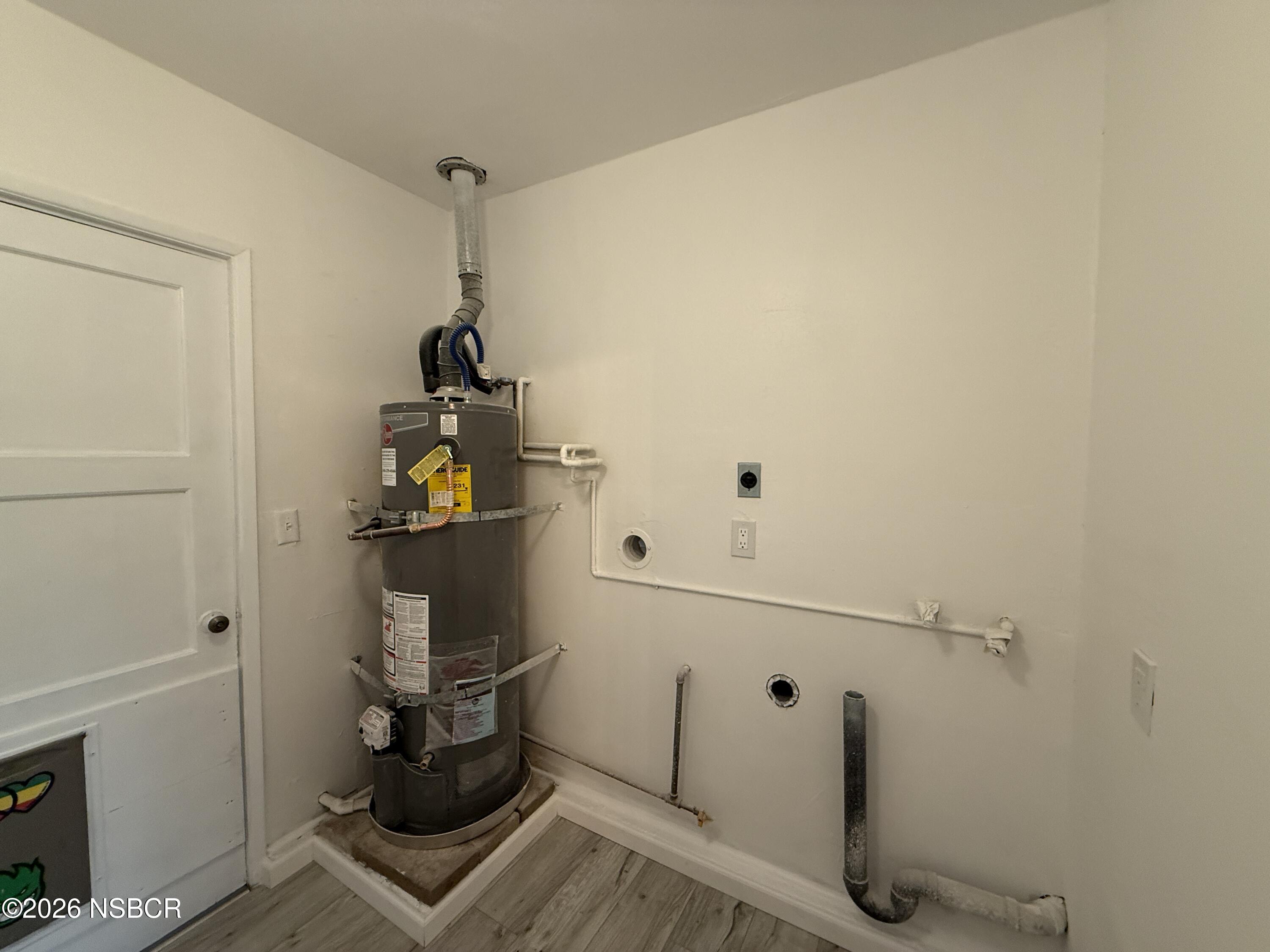 1408 West Walnut Avenue Lompoc, CA 93436 - Photo 20 of 27 a bathroom with a sink and mirror