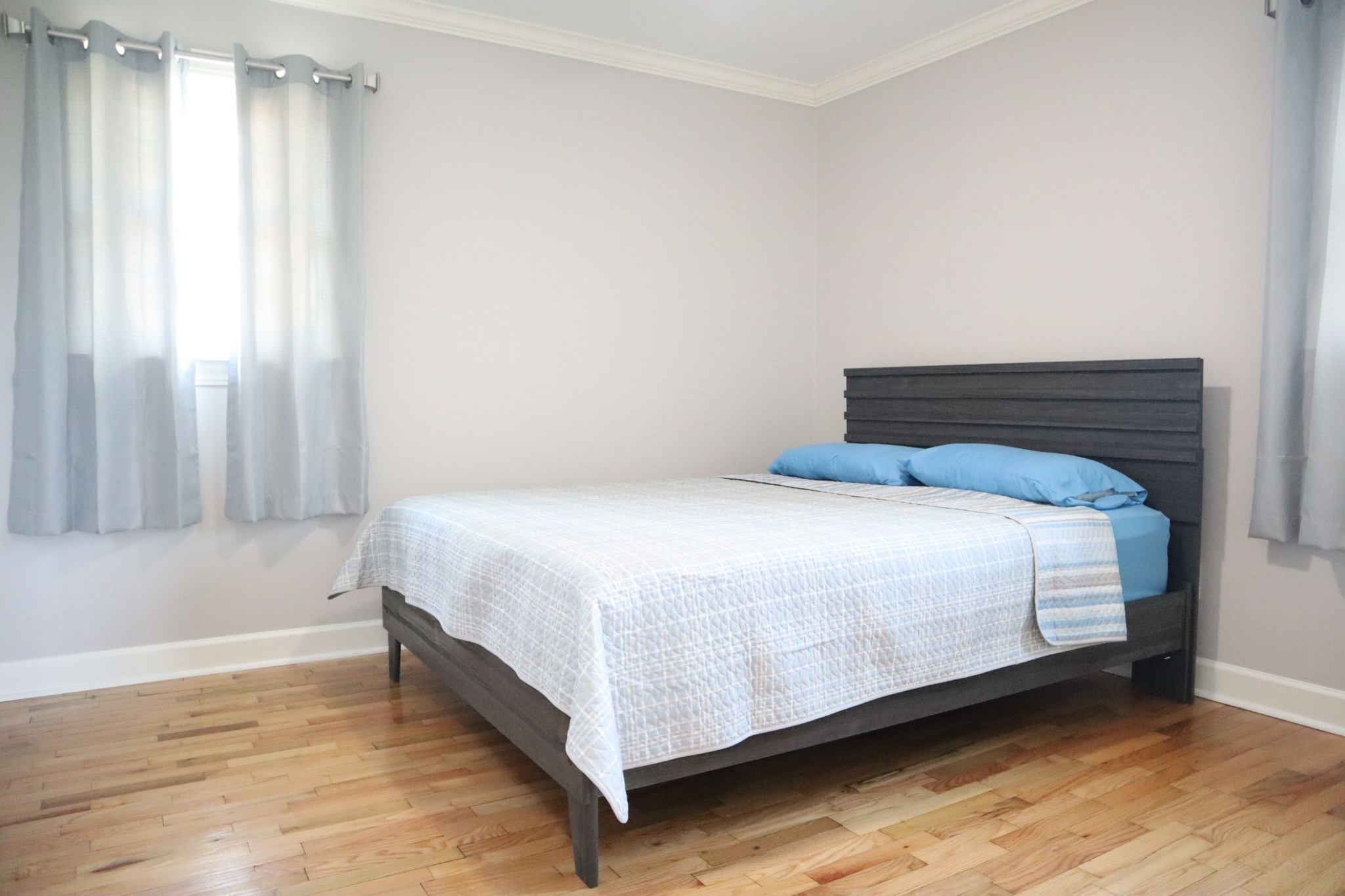 2206 Simmons Road Rives, TN 38253 - Photo 19 of 35 a large bed sitting in a bedroom next to a window