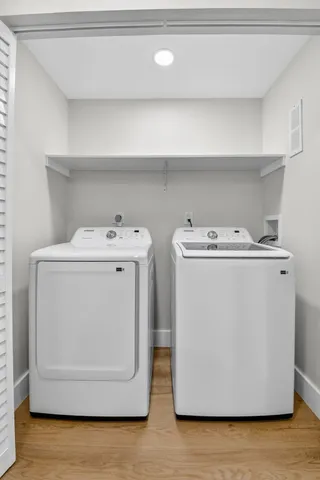 a utility room with dryer and washer