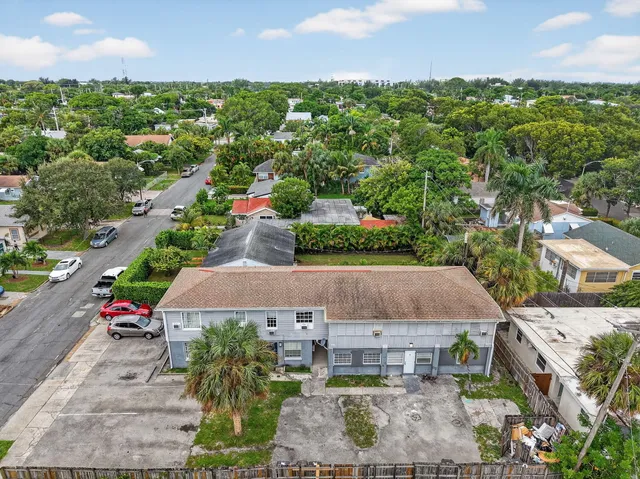 an aerial view of a house with a garden