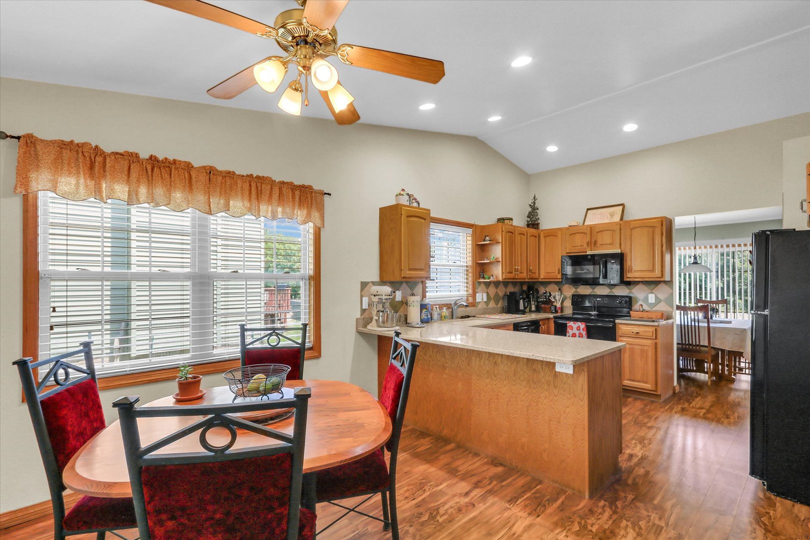 3110 Ridge Park Road Urbana, IL 61802 - Photo 14 of 26 a view of a dining room with furniture window and wooden floor