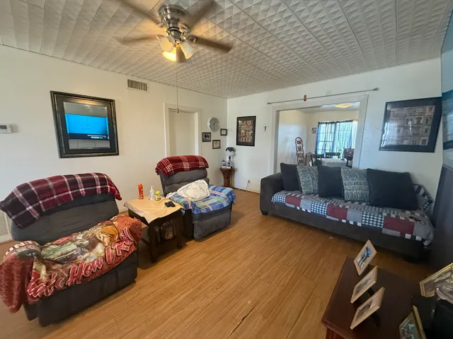 a living room with furniture and a couch