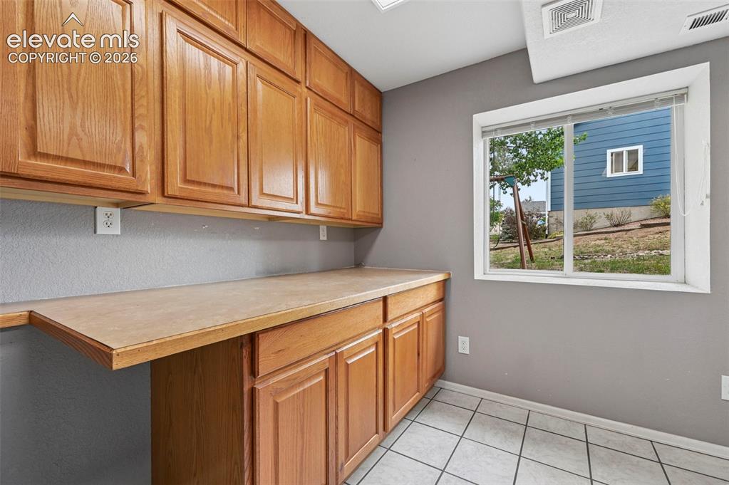 12571 Scamper Road Peyton, CO 80831 - Photo 31 of 49 Basement hobby area