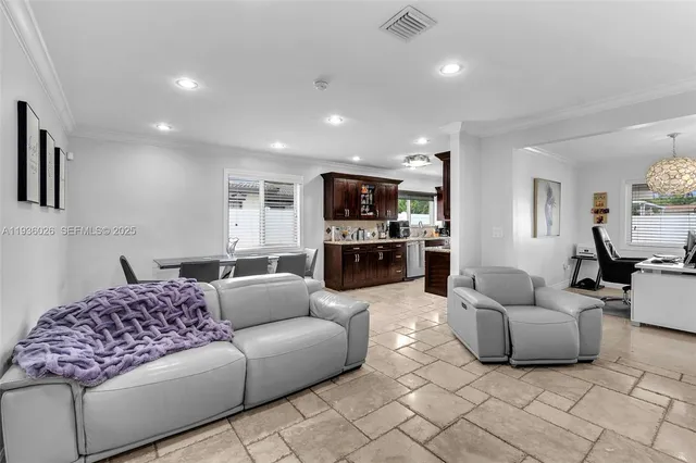 a living room with furniture and a couch