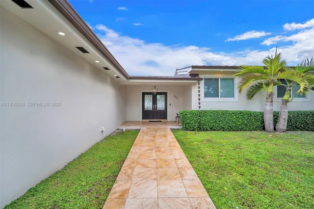 a view of a back yard of the house