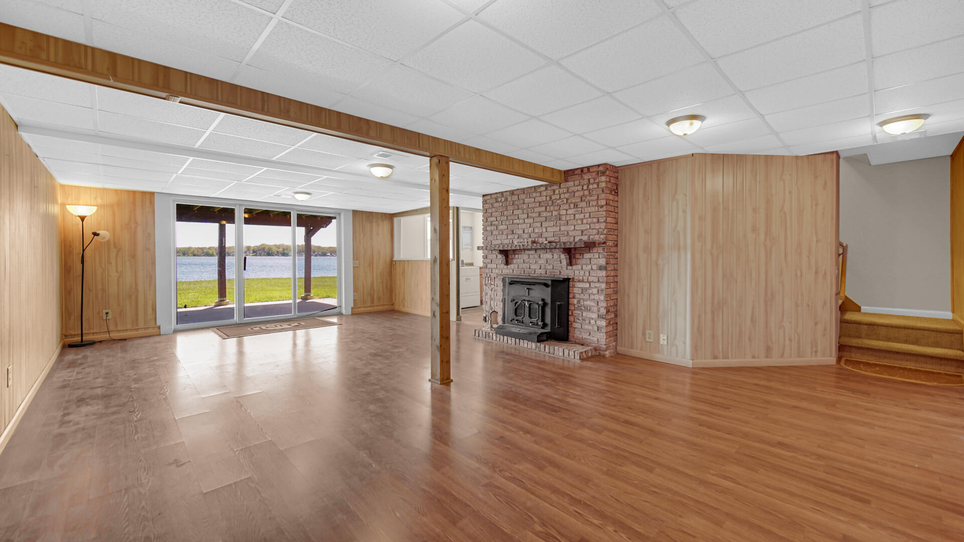 238 West Johnson Road La Porte, IN 46350 - Photo 21 of 35 a view of an empty room with a window and wooden floor