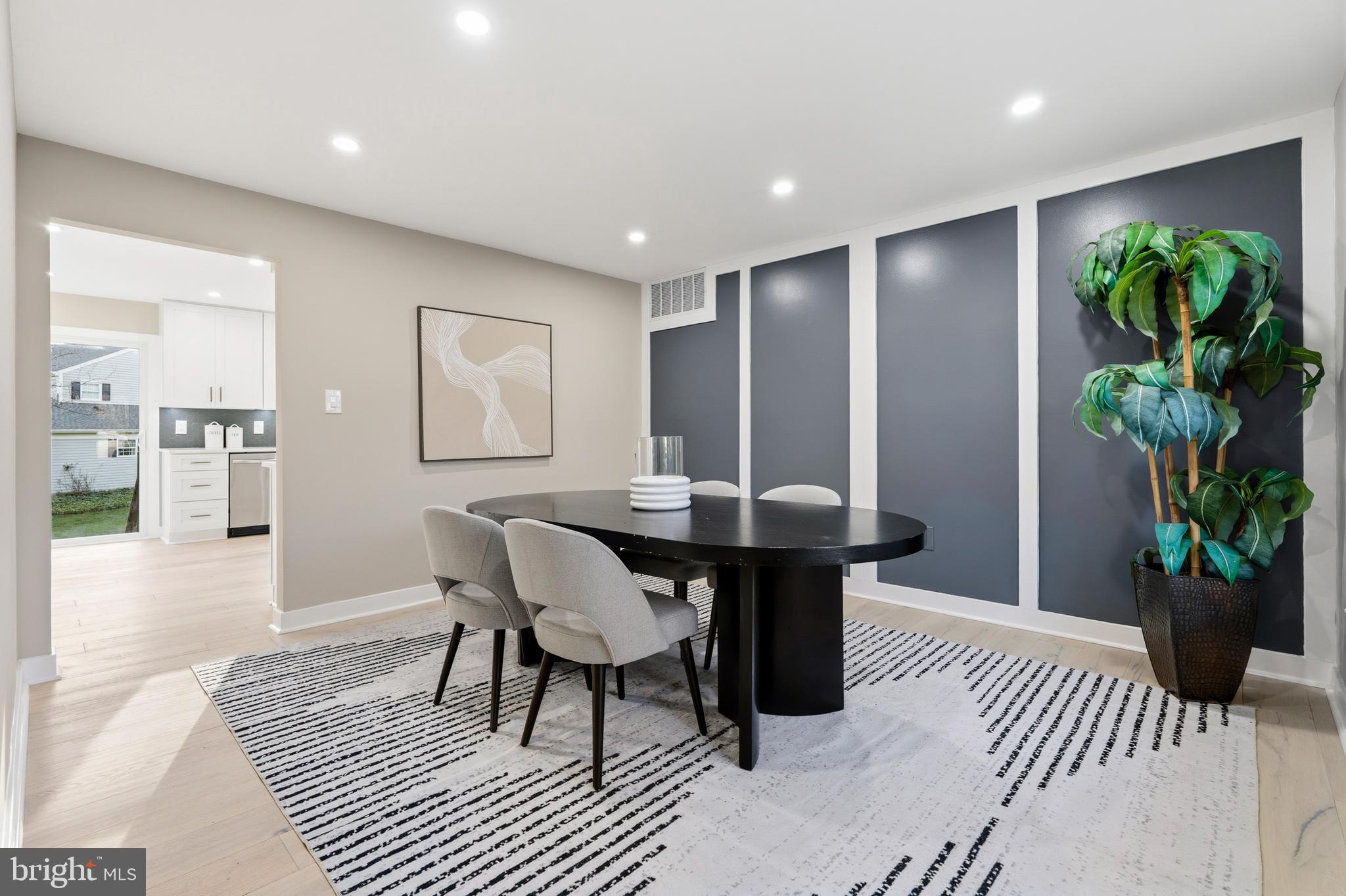 1840 Post Oak Trail Reston, VA 20191 - Photo 16 of 46 a view of a dining room with furniture