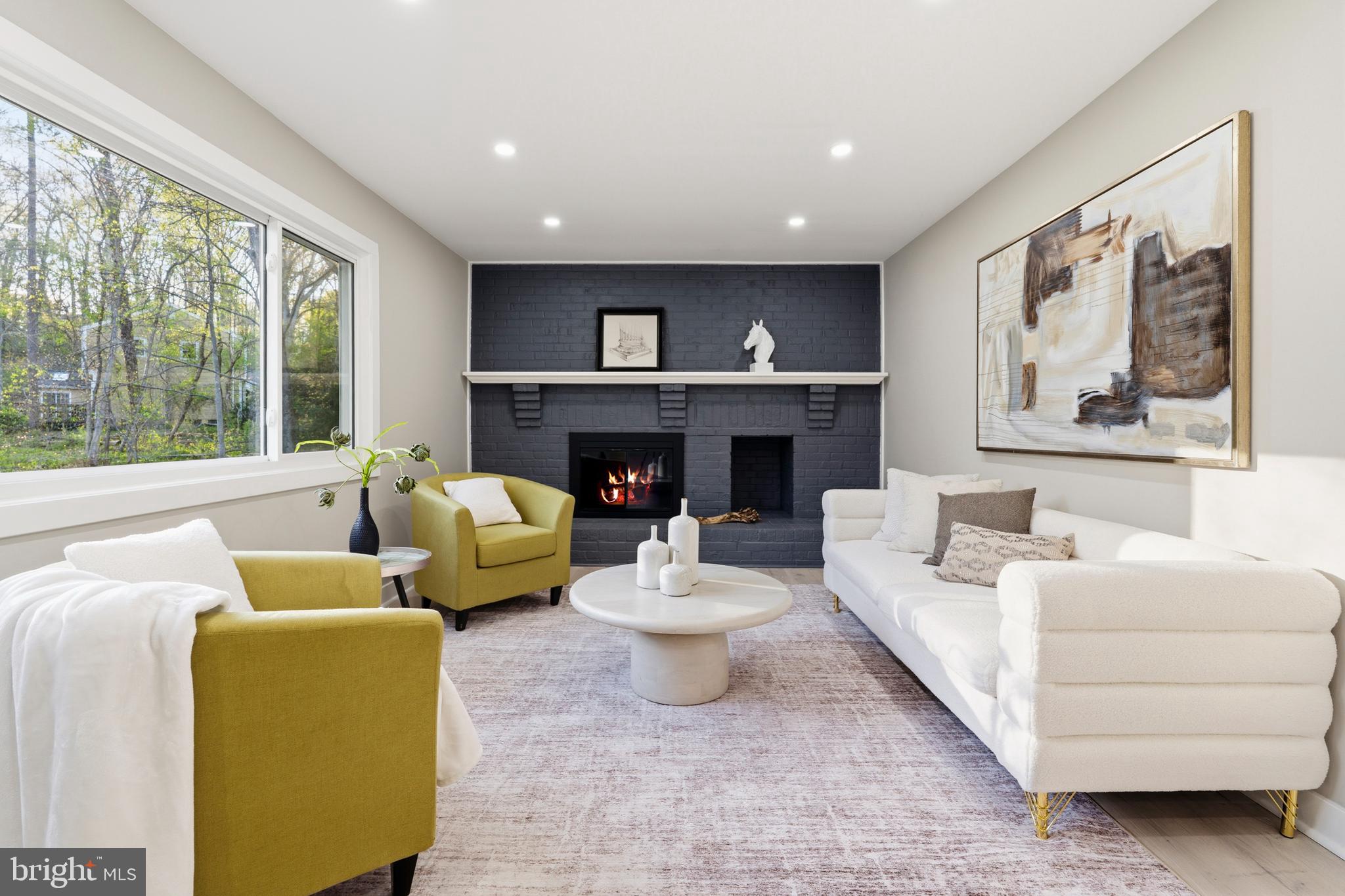 1840 Post Oak Trail Reston, VA 20191 - Photo 19 of 46 a living room with furniture and a large window