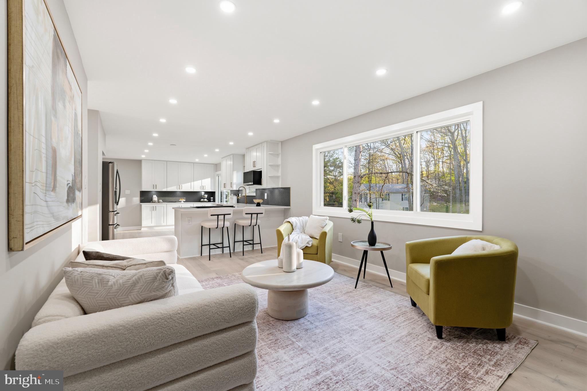 1840 Post Oak Trail Reston, VA 20191 - Photo 20 of 46 a living room with furniture and a large window