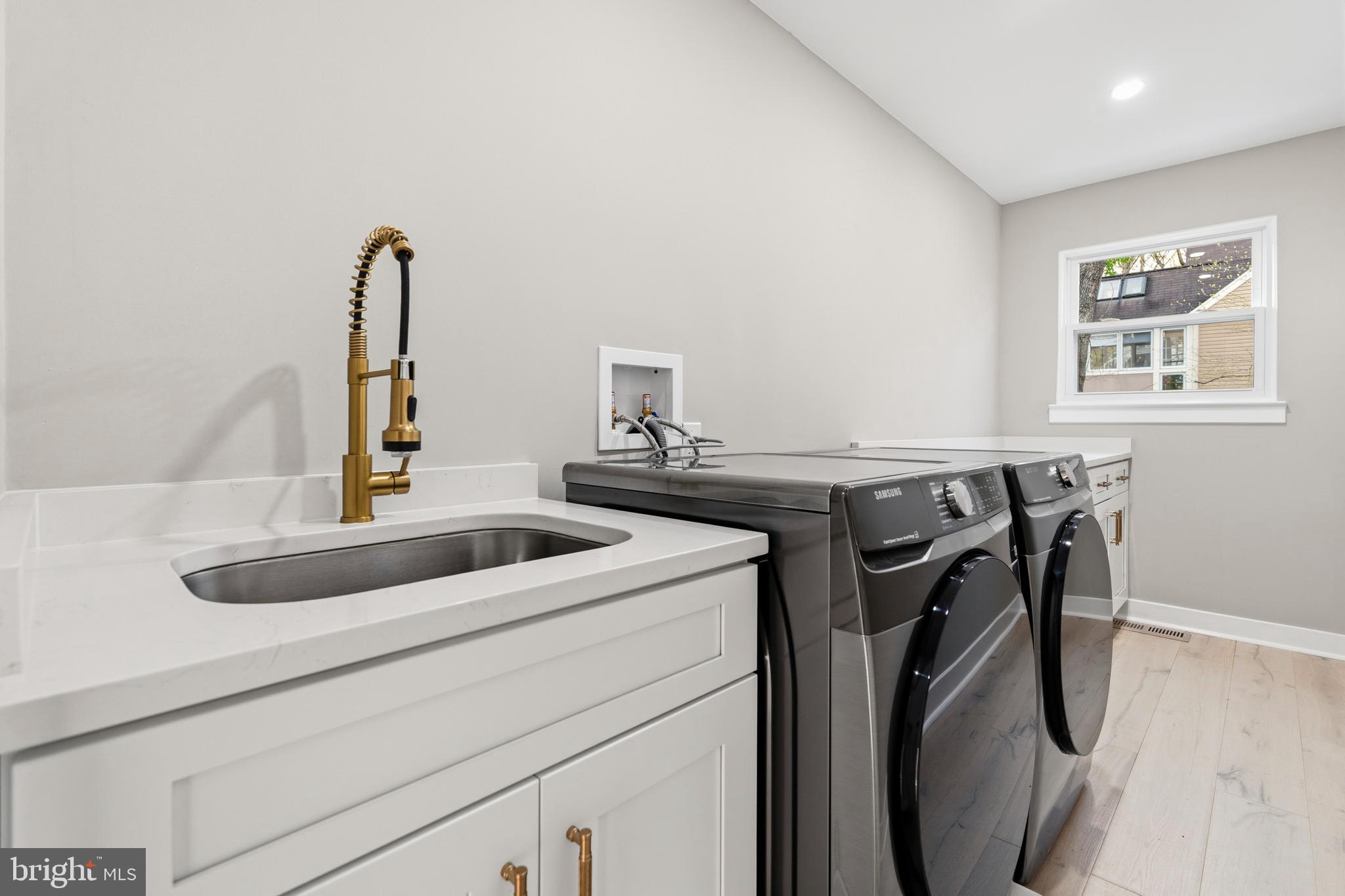 1840 Post Oak Trail Reston, VA 20191 - Photo 22 of 47 a utility room with dryer and washer