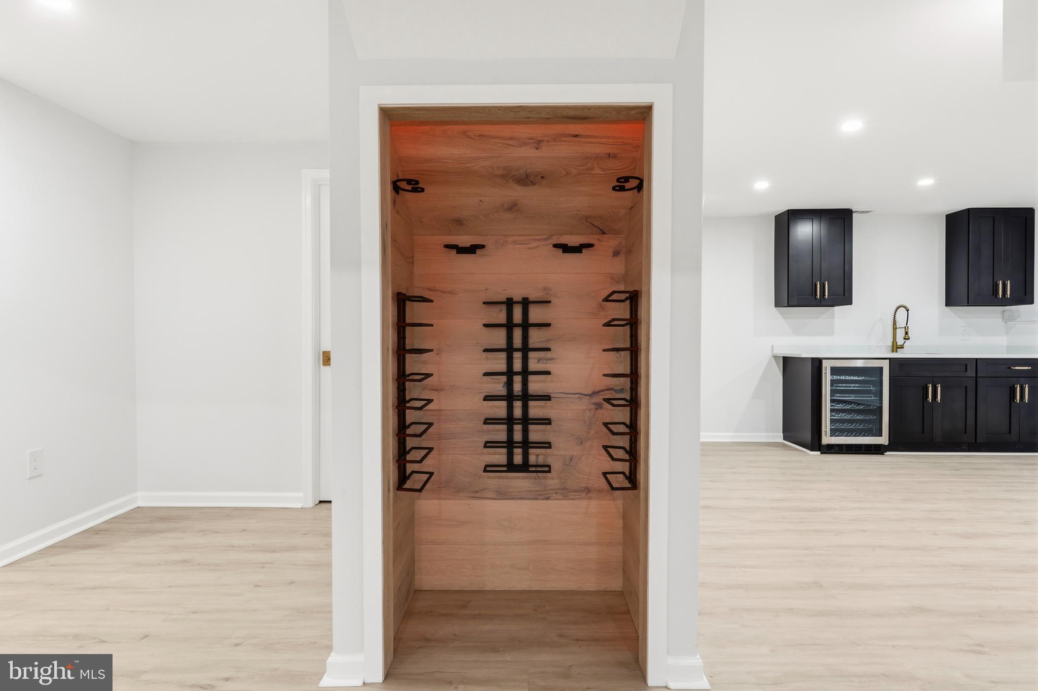 1840 Post Oak Trail Reston, VA 20191 - Photo 39 of 46 wooden floor in a kitchen with a sink