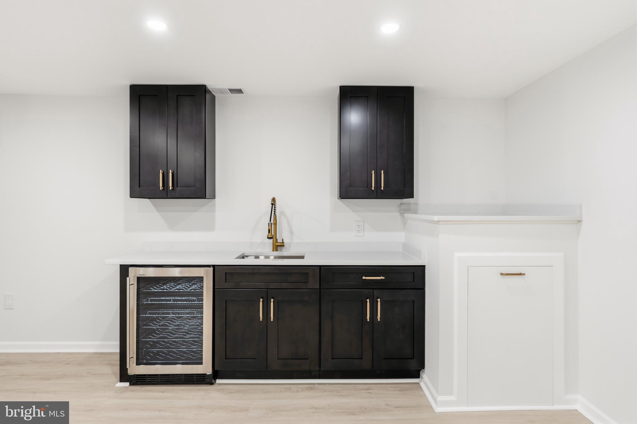 1840 Post Oak Trail Reston, VA 20191 - Photo 39 of 47 a bathroom with a sink and a mirror