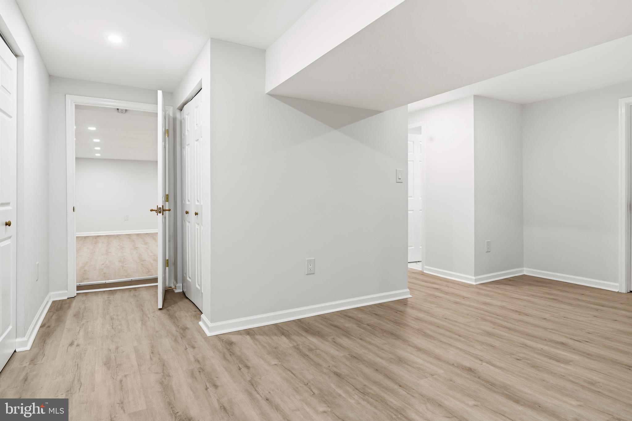 1840 Post Oak Trail Reston, VA 20191 - Photo 40 of 46 wooden floor in an empty room with a window