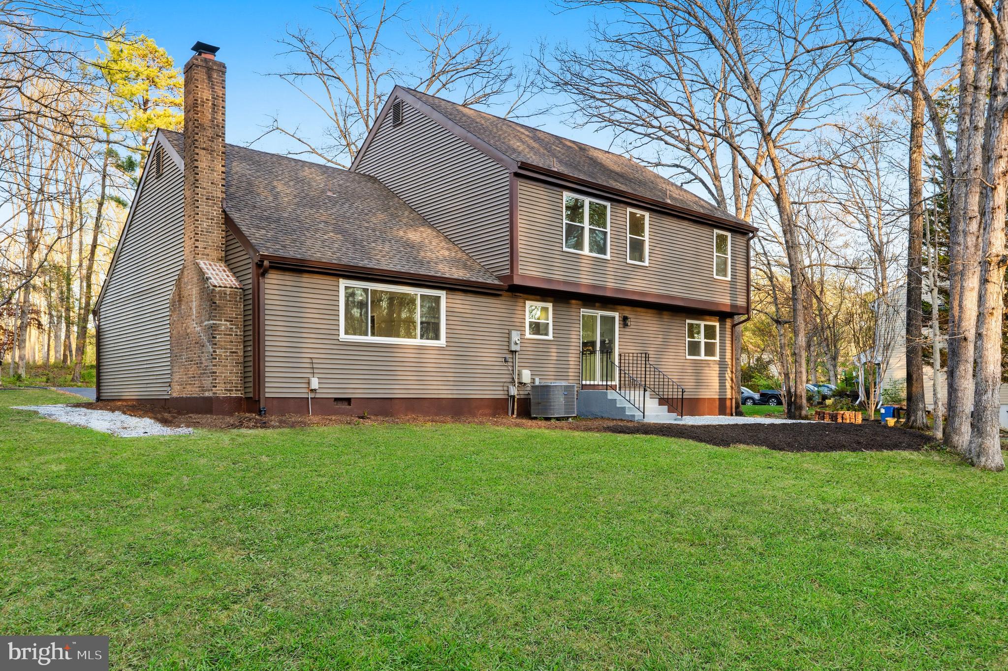 1840 Post Oak Trail Reston, VA 20191 - Photo 43 of 46 a view of a house with a yard