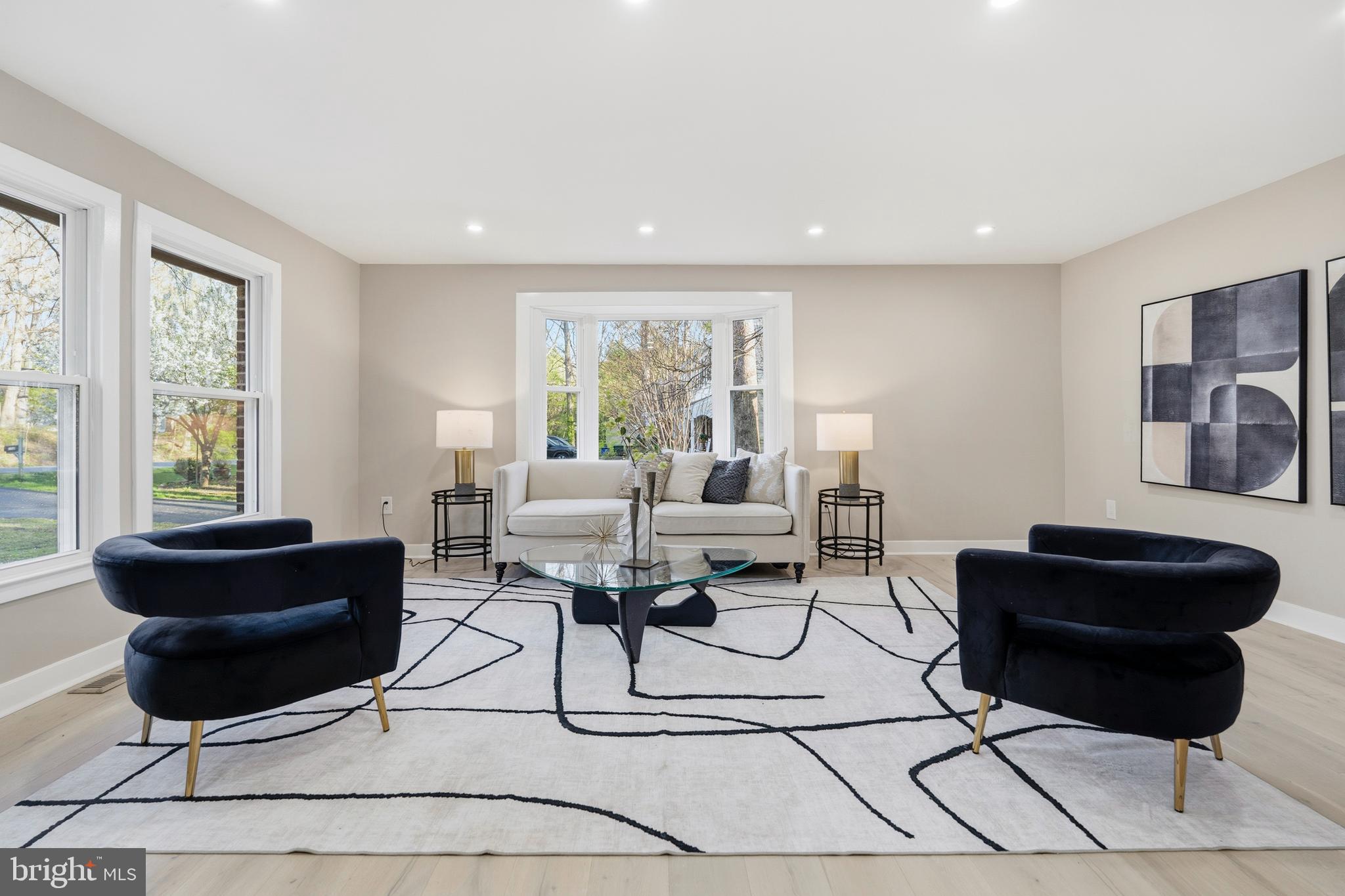 1840 Post Oak Trail Reston, VA 20191 - Photo 6 of 47 a living room with furniture and a large window