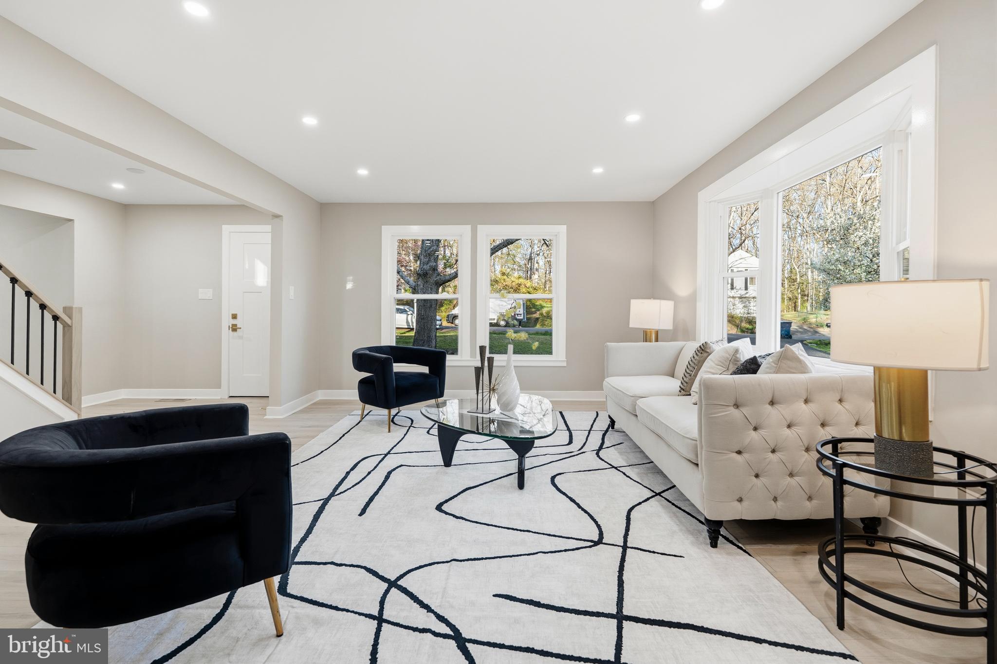 1840 Post Oak Trail Reston, VA 20191 - Photo 7 of 46 a living room with furniture and a large window