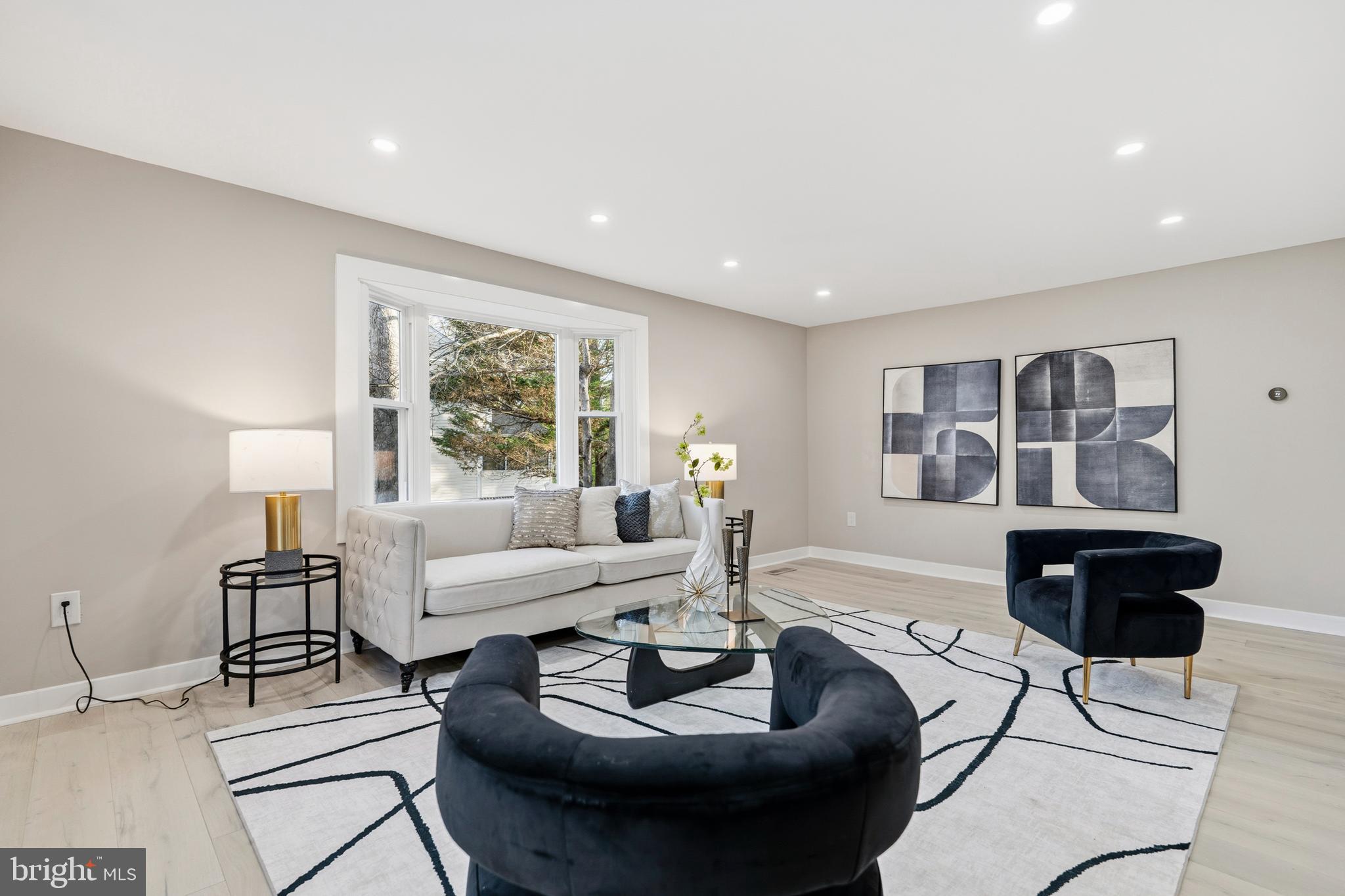 1840 Post Oak Trail Reston, VA 20191 - Photo 7 of 47 a living room with furniture and a large window