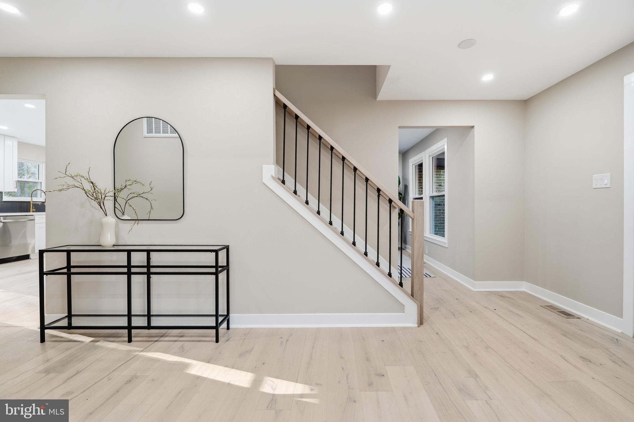 1840 Post Oak Trail Reston, VA 20191 - Photo 9 of 47 a view of staircase with lots of frames and stairs