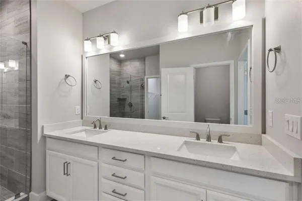 a bathroom with a shower and a toilet