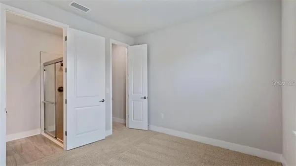 a bathroom with a sink and toilet