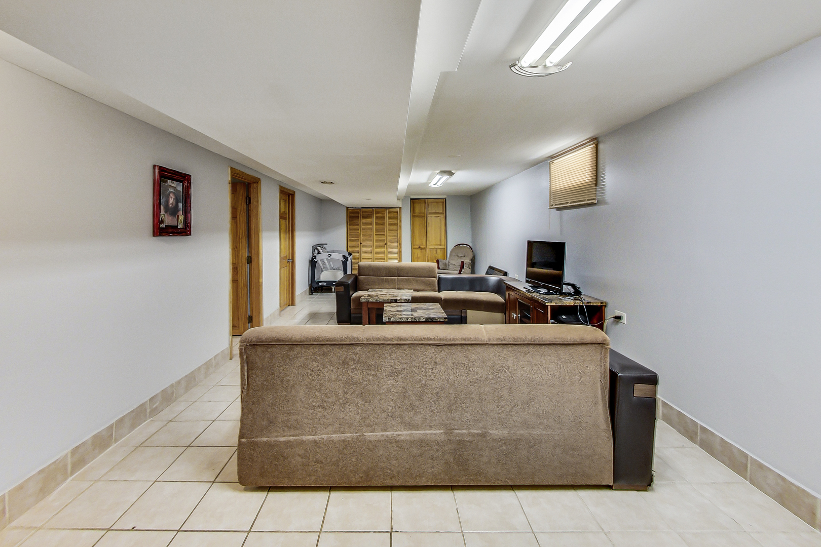 Undisclosed Address Chicago, IL 60625 - Photo 20 of 30 a view of kitchen with stainless steel appliances granite countertop a stove and a refrigerator
