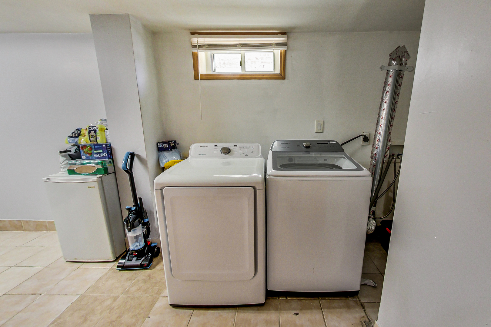 Undisclosed Address Chicago, IL 60625 - Photo 25 of 30 a utility room with dryer and washer