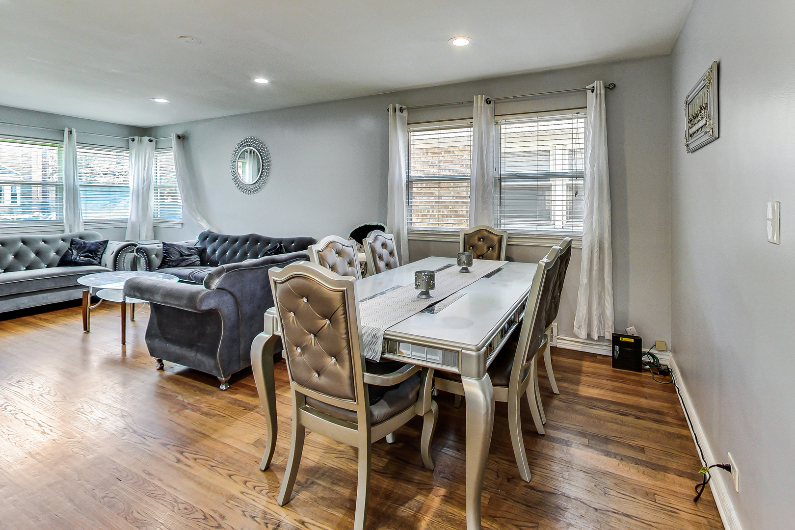 Undisclosed Address Chicago, IL 60625 - Photo 8 of 30 a view of a dining room with furniture window and wooden floor