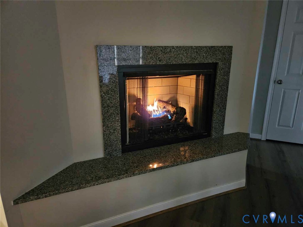 24580 St James Road Jetersville, VA 23083 - Photo 13 of 48 Fireplace featuring a granite surround and hearth,