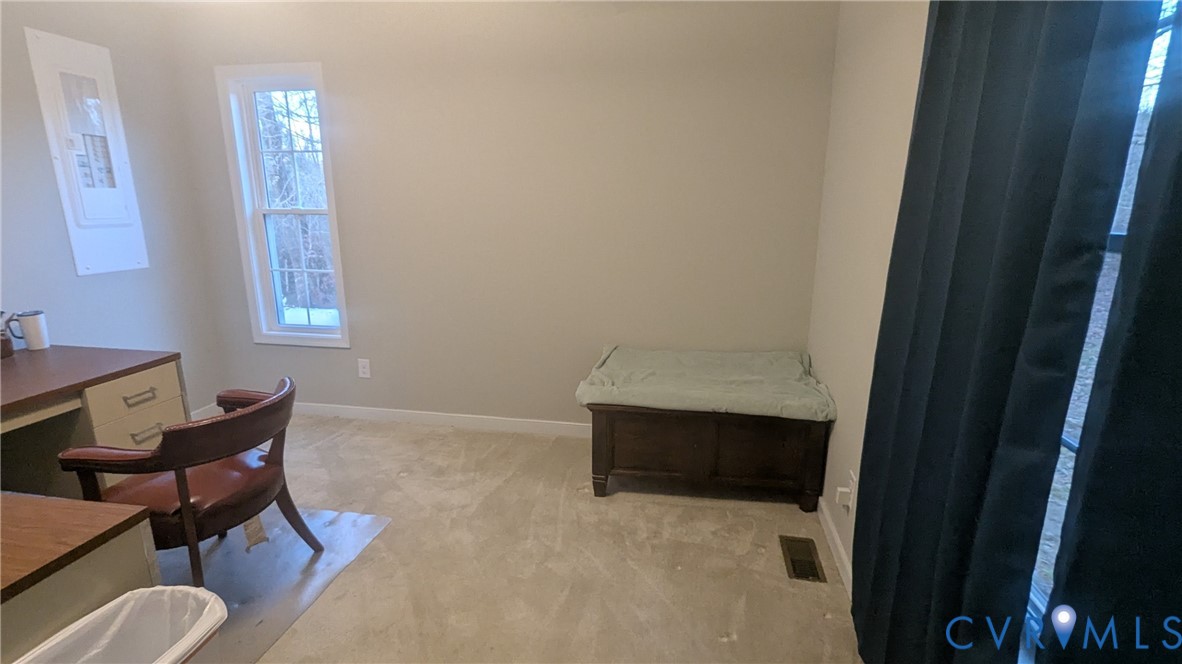 24580 St James Road Jetersville, VA 23083 - Photo 23 of 48 Carpeted interior space featuring a window with wh