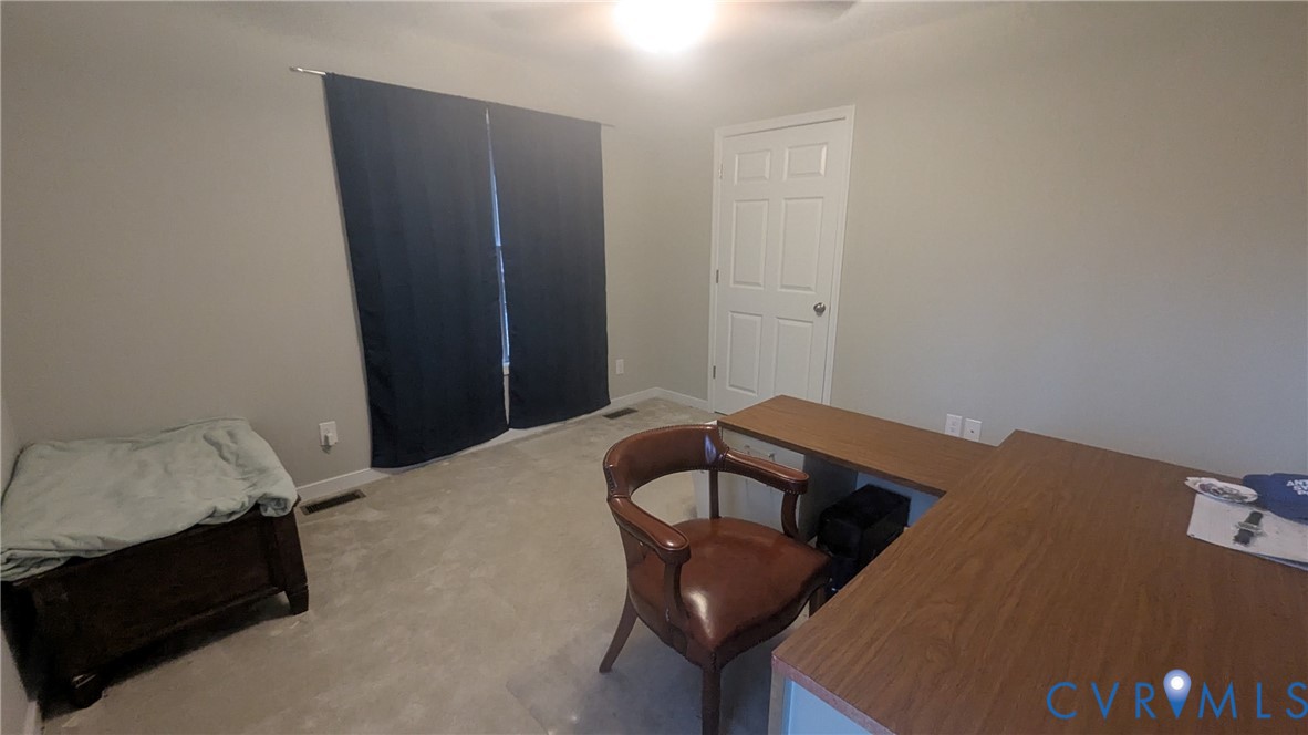 24580 St James Road Jetersville, VA 23083 - Photo 27 of 48 Carpeted room featuring light gray walls and a whi