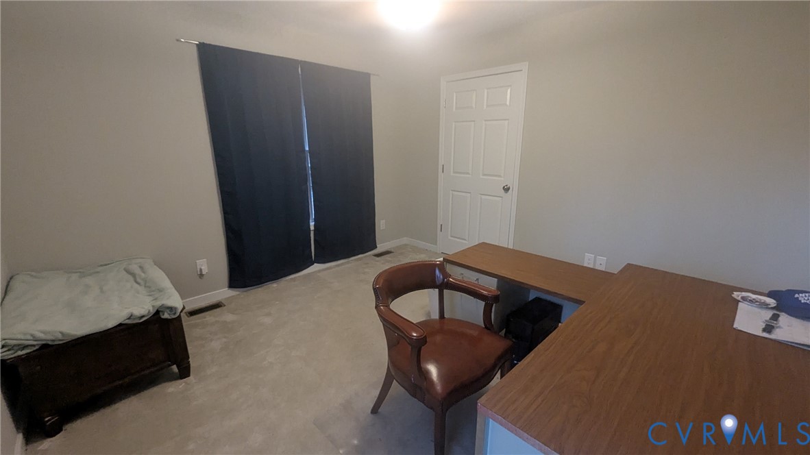 24580 St James Road Jetersville, VA 23083 - Photo 28 of 48 Carpeted room with neutral wall paint and a single
