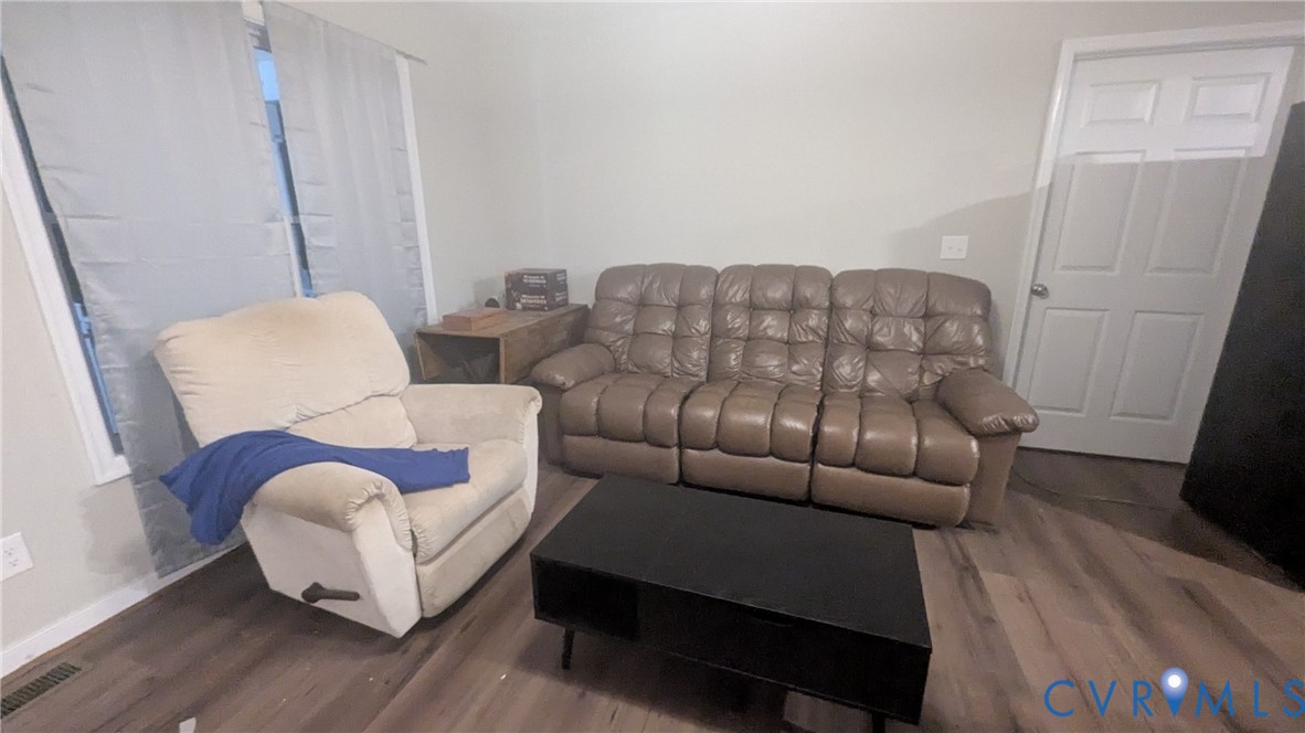 24580 St James Road Jetersville, VA 23083 - Photo 43 of 48 Living area featuring wood-finish flooring, light-