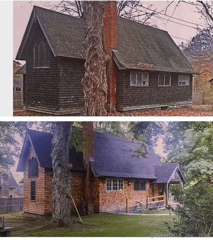 a view of house with a yard