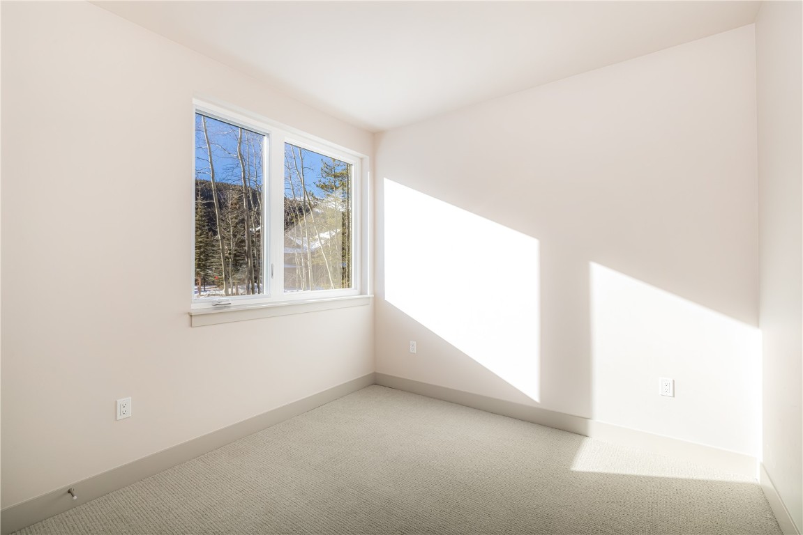 628 Montezuma Road, Unit D1 Keystone, CO 80435 - Photo 19 of 31 a view of an empty room with a window