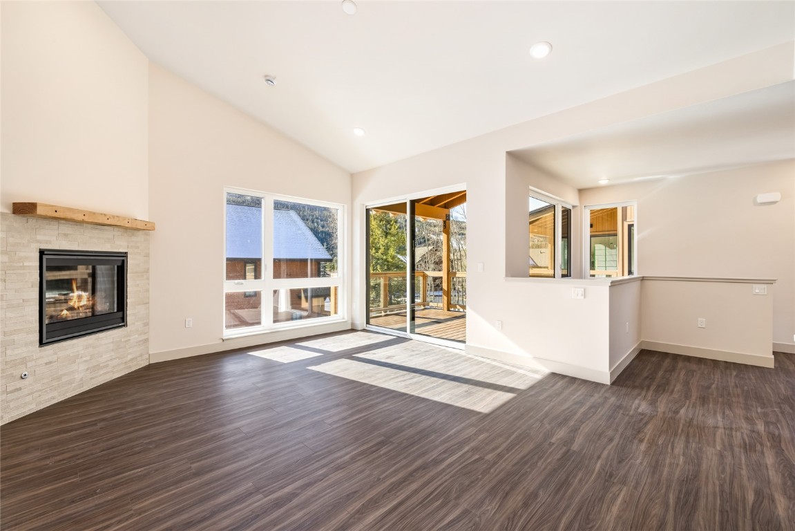 628 Montezuma Road, Unit D1 Keystone, CO 80435 - Photo 3 of 29 an empty room with wooden floor and windows