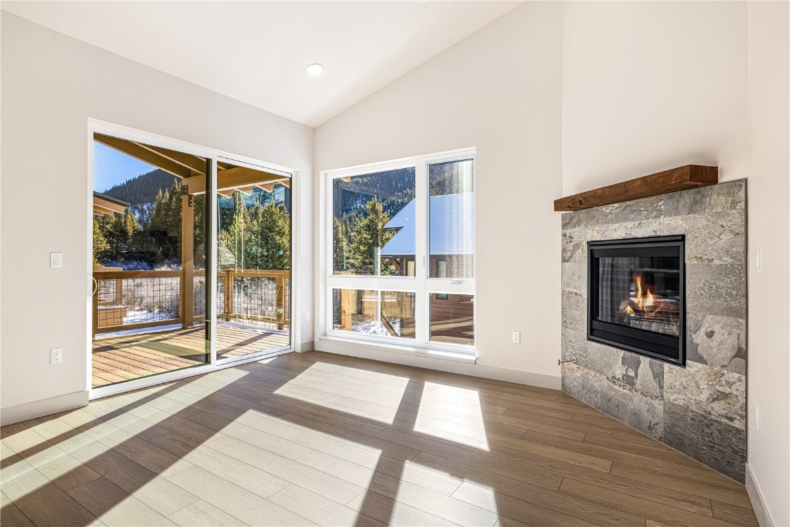 628 Montezuma Road, Unit D1 Keystone, CO 80435 - Photo 3 of 31 a living room with furniture and a fireplace