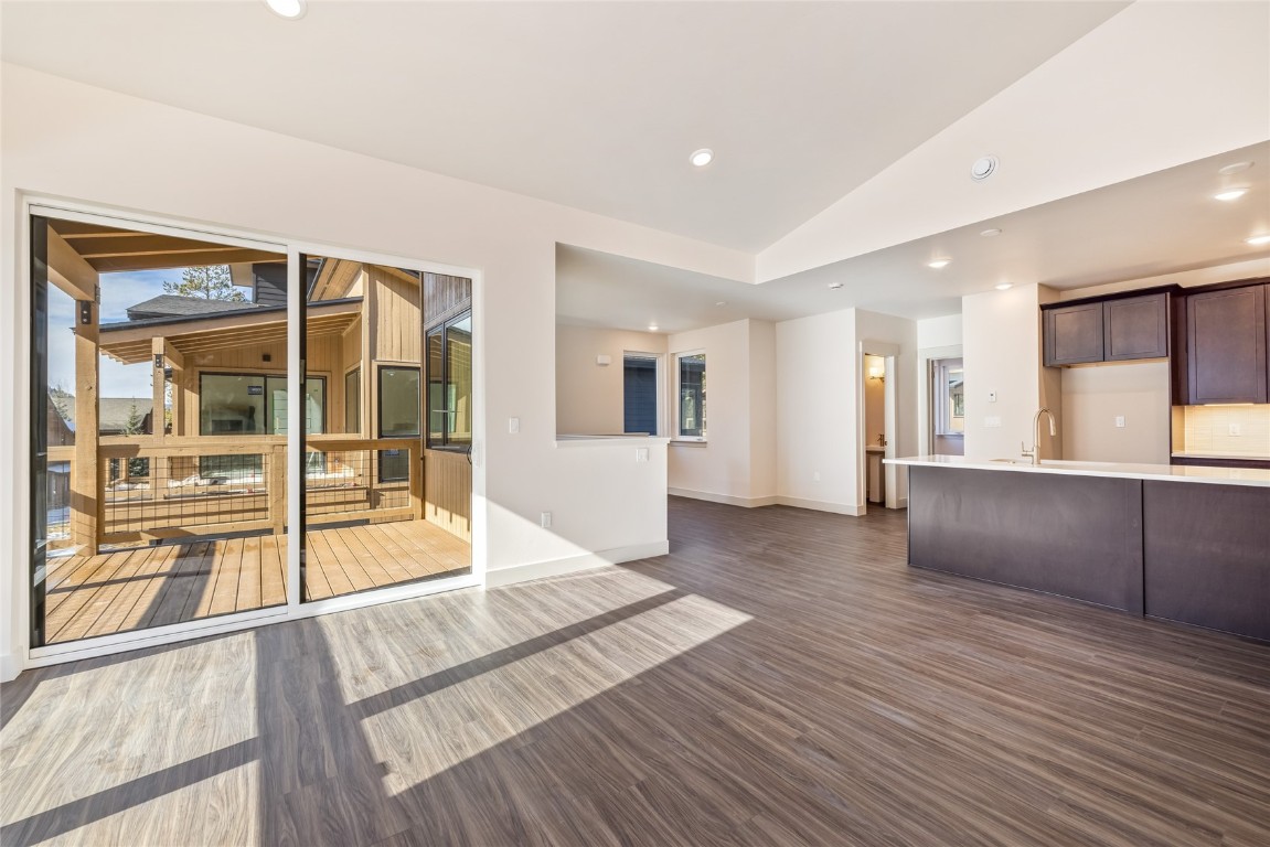 628 Montezuma Road, Unit D1 Keystone, CO 80435 - Photo 6 of 29 a view of a big room with wooden floor and windows