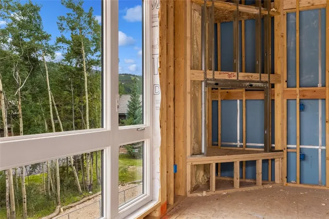a view of a house with a door and balcony